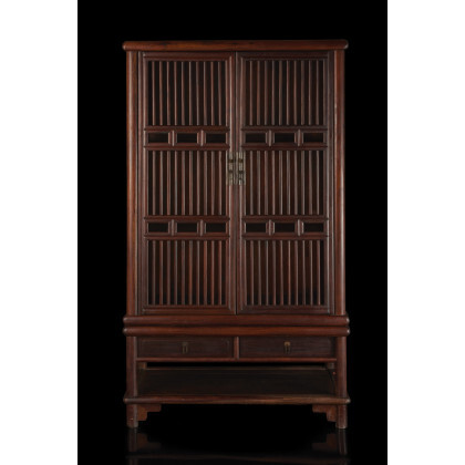 A hongmu wood cabinet on stand, the lower part with two drawers and a shelf, the upper part with slatted...