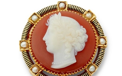 A Victorian hard stone cameo and split pearl brooch.