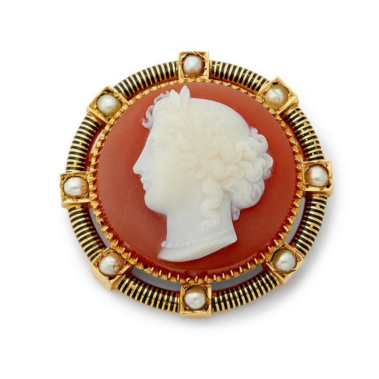 A Victorian hard stone cameo and split pearl brooch.