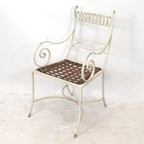 A mid-century wrought-iron armchair in a Regency manner