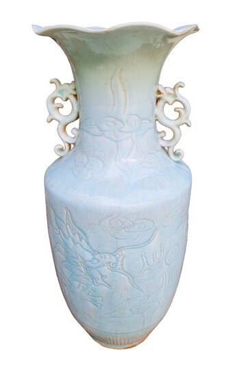 A modern Chinese Qingbai glazed vase with incised dragon