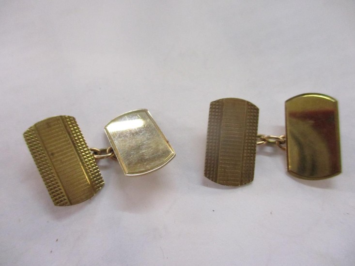 A pair of 9ct gold cufflinks Location:Cab