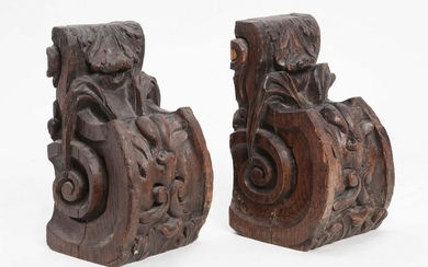 A pair of Baroque style carved oak corbels