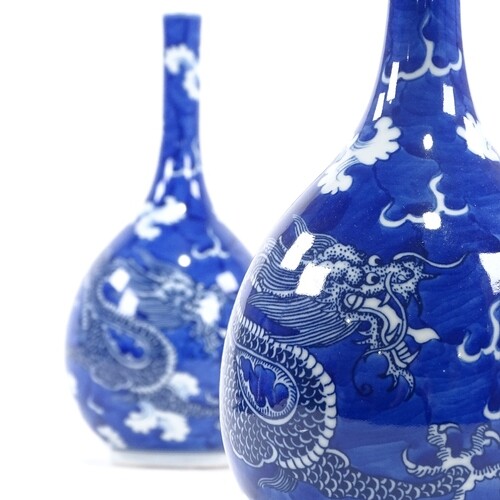 A pair of Chinese blue and white porcelain narrow-neck drago...