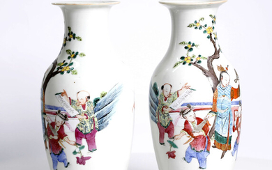 A pair of Chinese porcelain vases, depicting young boys. Republic period