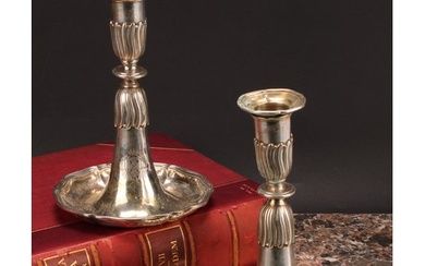 A pair of Swiss silver candlesticks, detachable nozzles, hal...