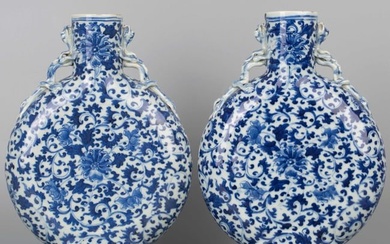 A pair of blue and white porcelain dragon ear vases, 18th century