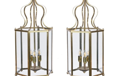 A pair of brass and glazed hexagonal hall lanterns