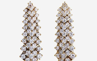 A pair of diamond and eighteen karat gold earrings