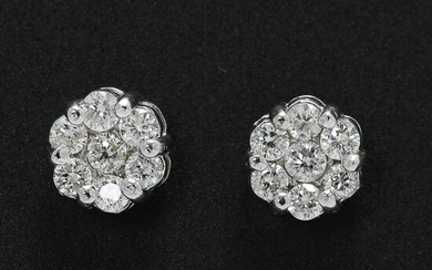 SOLD. A pair of diamond ear pendants each set with numerous diamonds weighing a total of app. 0.48 ct., mounted in 14k white gold. (2) – Bruun Rasmussen Auctioneers of Fine Art