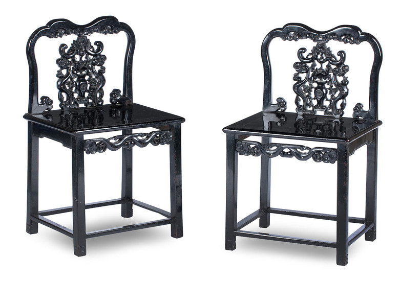 A pair of ebonised hardwood side chairs
