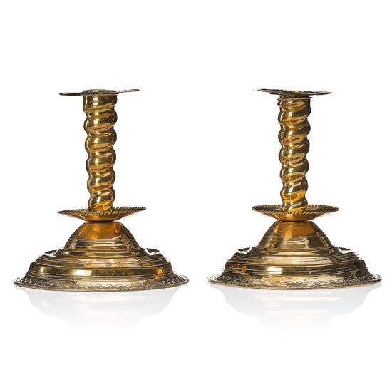 A pair of late Baroque candlesticks.