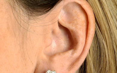 A pair of old-cut diamond floral cluster stud earrings.