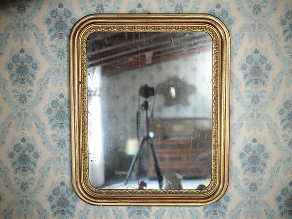 A pastiglia and giltwood mirror begin of 20th century