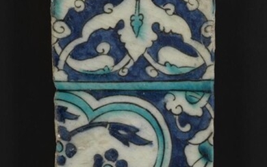 NOT SOLD. A pottery tile decorated in blue and turquoise with flowers. Possibly Syria, 17th century. 26 x 11 cm. – Bruun Rasmussen Auctioneers of Fine Art