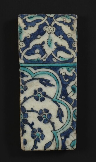 NOT SOLD. A pottery tile decorated in blue and turquoise with flowers. Possibly Syria, 17th century. 26 x 11 cm. – Bruun Rasmussen Auctioneers of Fine Art