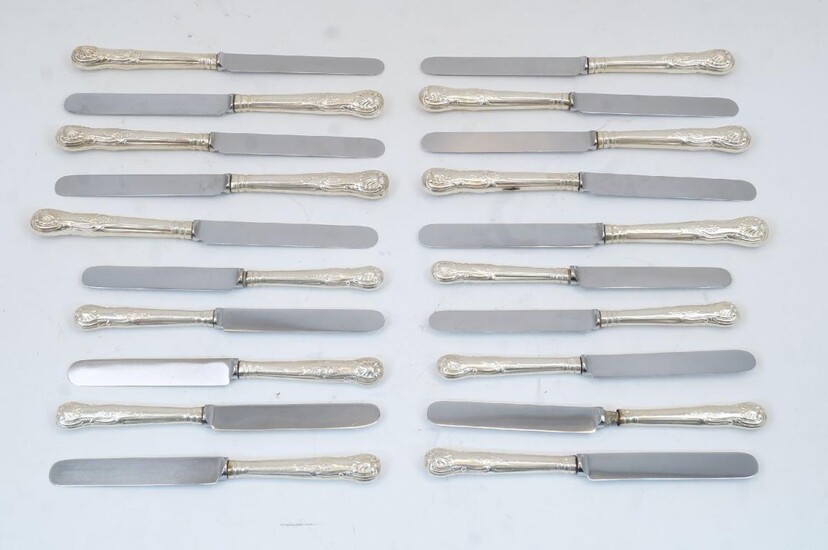 A quantity of of Victorian silver handled knives, London, 1897, makers marks rubbed, comprising ten table knives and ten dessert knives, with filled silver handles engraved with crest and having later stainless steel blades (20)