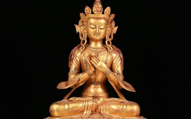 A sacred gilt bronze statue of Bodhisattva inlaid with hundreds of treasures