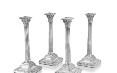 A set of four Victorian silver Corinthian column candlesticks, Henry Wilkinson & Co, London, 1871