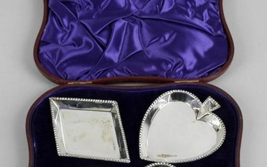 A set of four late Victorian silver dishes, each with