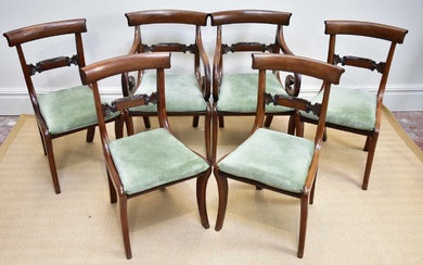 A set of six Regency mahogany bar back dining chairs...