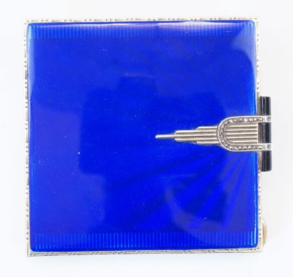 A silver and blue enamel compact, Birmingham, 1948, Henry Clifford Davis, with mirror to interior of lid, approx. 6.5cm wide, 6.7cm deep