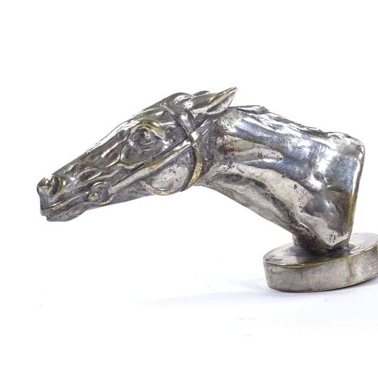 A silver patinated bronze racehorse design car mascot, mid-2...