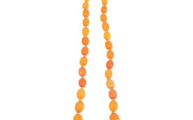 A single-strand graduated butterscotch amber bead necklace, ...