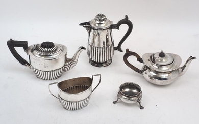 A small collection of tea wares, comprising: a Victorian bachelor's teapot and twin handled sugar bowl, Birmingham, 1898, William M Hayes, with half gadrooned bodies, engraved Z. Barraclough & Sons, Briggate, Leeds to bases; a further teapot...