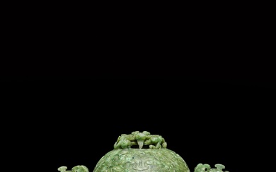 A spinach-green jade archaistic tripod incense burner and cover, Qing dynasty, 18th - 19th century | 清十八至十九世紀 碧玉雕龍耳三足爐連蓋