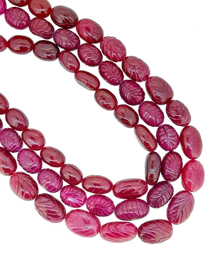 A three row carved ruby bead necklace