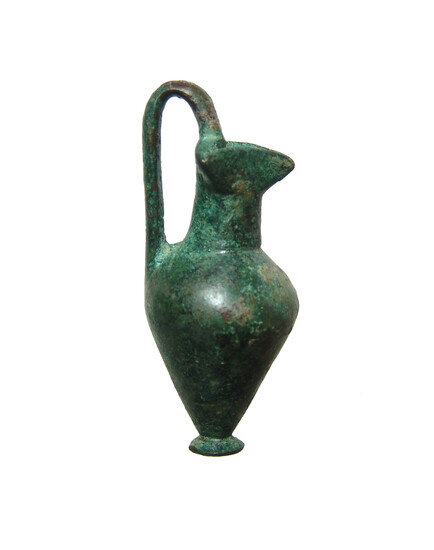 A well-preserved Greek bronze votive trefoil olpe