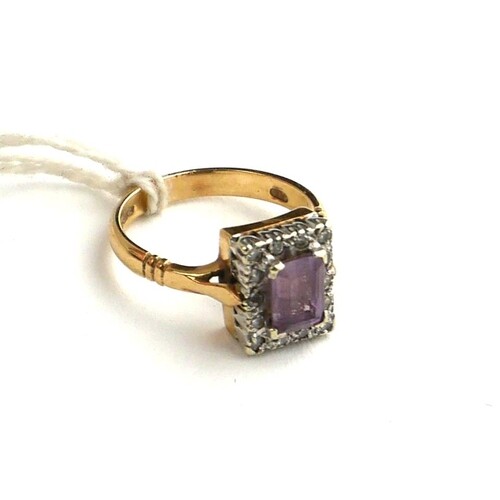 AN EDWARDIAN STYLE 9CT GOLD, AMETHYST AND DIAMOND DRESS RING...