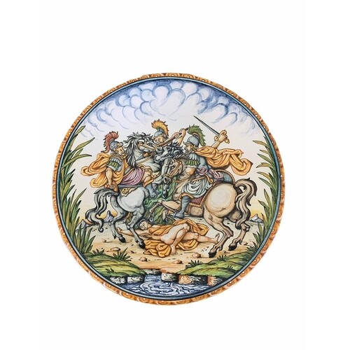 AN ITALIAN MAJOLICA RENAISSANCE STYLE CHARGER Painted with a...
