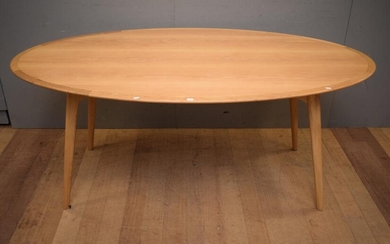 AN OAK MID-CENTURY STYLE OVAL TABLE (A/F) (76H x 185W x 100D CM) (PLEASE NOTE THIS HEAVY ITEM MUST BE REMOVED BY CARRIERS AT THE CUS...