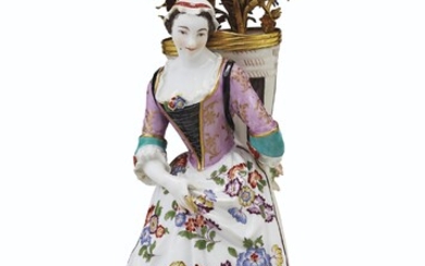 AN ORMOLU-MOUNTED MEISSEN PORCELAIN BOUQUETIERE FIGURE, CIRCA 1740-50, THE MODEL BY J.J. KANDLER, THE MOUNTS PROBABLY GERMAN, THE BASKET MOUNT MID-18TH CENTURY, THE BASE SECOND QUARTER 19TH CENTURY