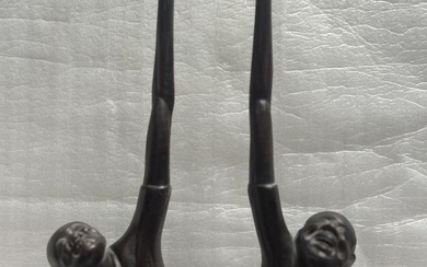 ART DECO PAIR OF CARVED WOOD, BOYS SITTING AND GRABING FOR THE STARS