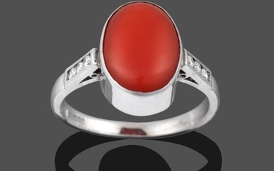 An 18 Carat White Gold Coral and Diamond Ring, the...