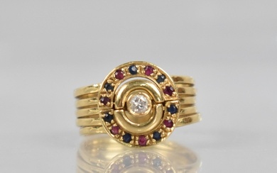An 18ct Gold, Diamond, Ruby and Sapphire Dress Ring, Compris...