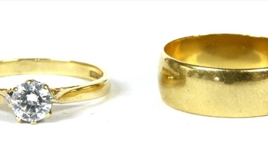 An 18ct gold D section wedding ring
