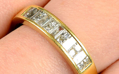 An 18ct gold baguette-cut and square-shape diamond half-eternity ring.