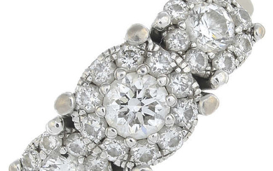 An 18ct gold brilliant-cut diamond triple cluster ring.