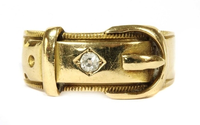 An 18ct gold diamond set buckle ring