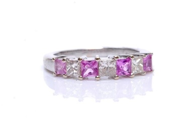 An 18ct hallmarked white gold pink sapphire and diamond seve...