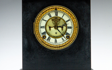 An Ansonia slate mantle clock (H:31cm) With key and pendulum...