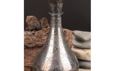 An Indian bidri baluster vase or hookah base, profusely deco...