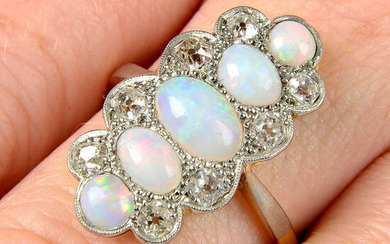 An early 20th century platinum and 18ct gold, opal and diamond ring.