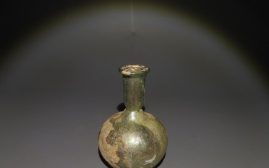 Ancient Roman Glass Ungüentarium, 1st - 3rd century AD. 7 cm Height.