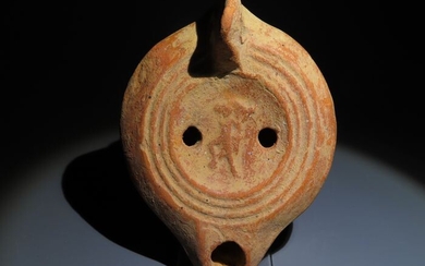 Ancient Roman Terracotta Oil lamp with a god Dionysus figure. c. 1st - 2nd Century AD.12 cm Large.
