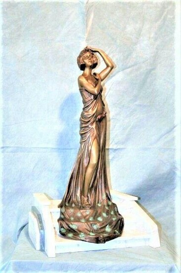 Art Deco Sculpture ,Lady walking down steps ,Title ;